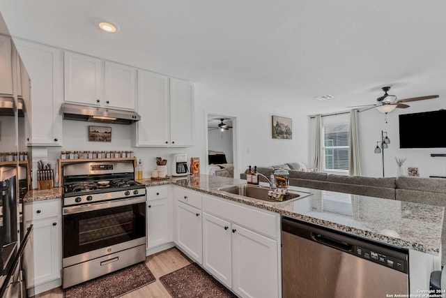 kitchen featuring white cabinets and stainless steel appliances