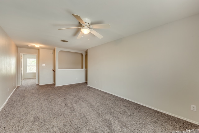 unfurnished room featuring carpet flooring and ceiling fan