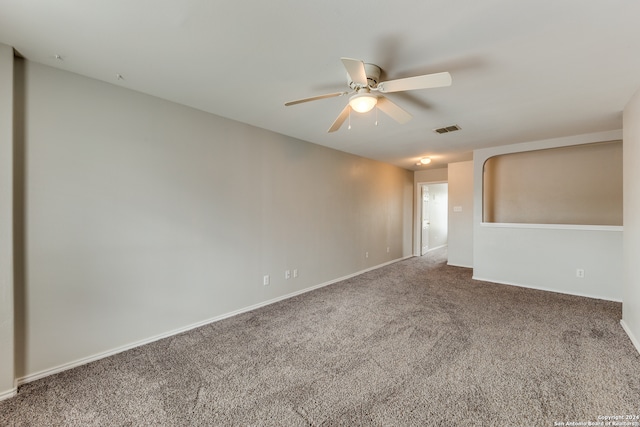 carpeted empty room with ceiling fan