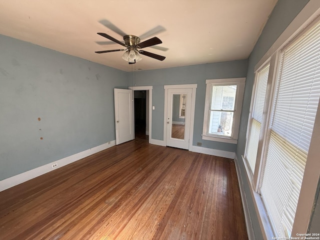 140 Jeffrey, San Antonio, TX 78201 - unfurnished bedroom featuring baseboards, a ceiling fan, and wood finished floors