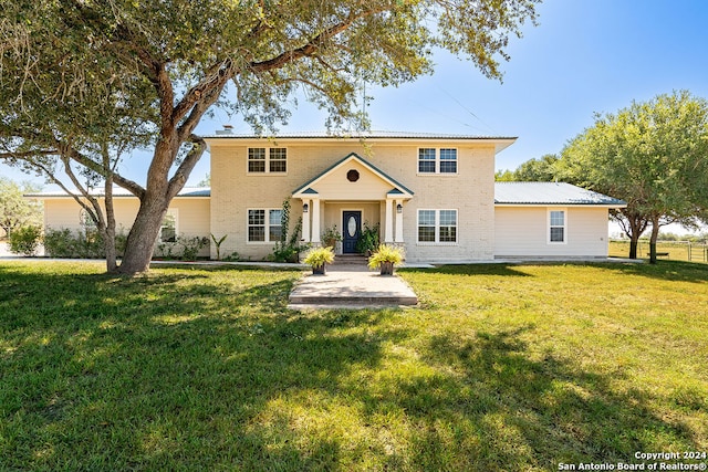 view of front of property with a front yard