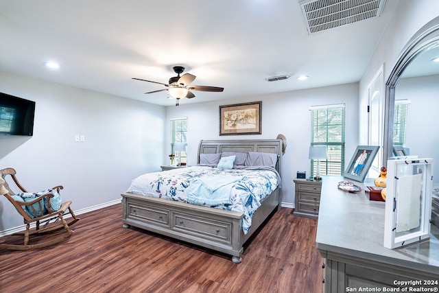 bedroom featuring dark wood-type flooring and ceiling fan