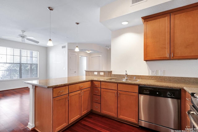 7342 Oak Manor Dr Unit 1204, San Antonio, TX 78229 - kitchen with stainless steel dishwasher, a sink, a peninsula, and dark wood-type flooring
