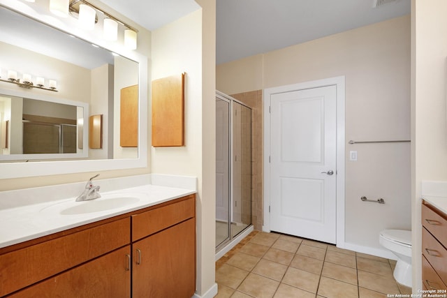 7342 Oak Manor Dr Unit 1204, San Antonio, TX 78229 - full bath featuring vanity, a stall shower, tile patterned flooring, and toilet