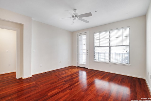 7342 Oak Manor Dr Unit 1204, San Antonio, TX 78229 - empty room with healthy amount of natural light, wood finished floors, baseboards, and ceiling fan