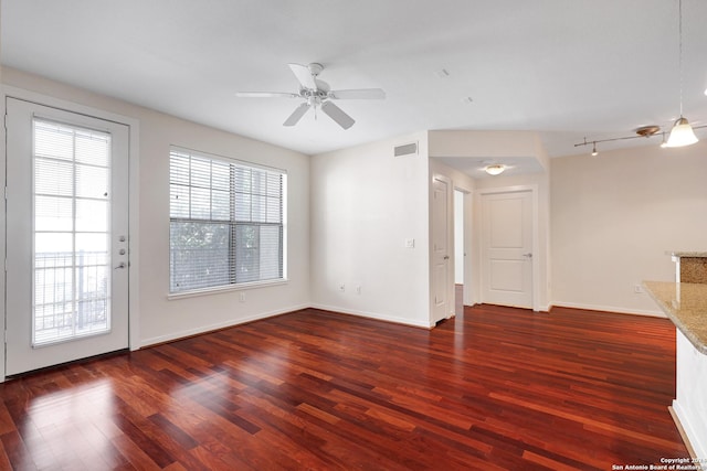 7342 Oak Manor Dr Unit 1204, San Antonio, TX 78229 - unfurnished living room featuring wood finished floors, baseboards, and a ceiling fan