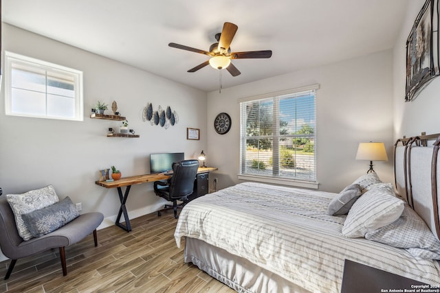 bedroom featuring wood-type flooring and ceiling fan