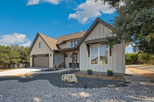 modern inspired farmhouse featuring a garage