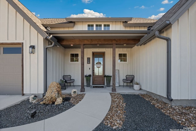 property entrance with a garage