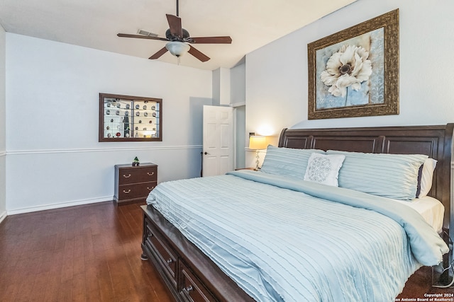 bedroom featuring dark wood-type flooring and ceiling fan