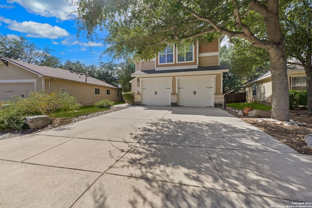 view of side of home with a garage