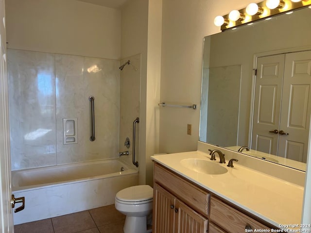 full bathroom featuring vanity, bathing tub / shower combination, toilet, and tile patterned floors