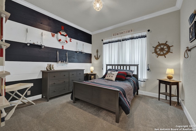 bedroom with ornamental molding, carpet, and baseboards