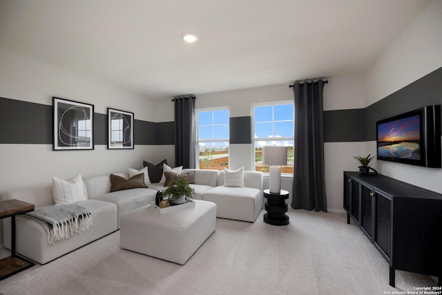living room featuring light carpet and recessed lighting