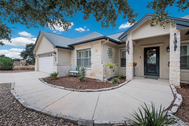 view of front of house with a garage