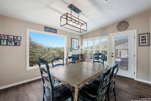 1138 Royal Eagle, Fischer, TX 78623 - dining room featuring dark wood-style flooring and baseboards