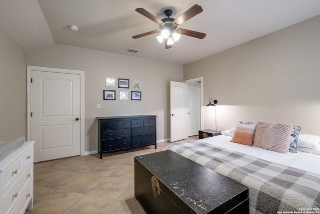 bedroom with light tile patterned floors and ceiling fan