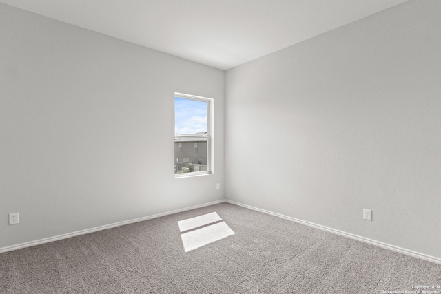 empty room featuring carpet