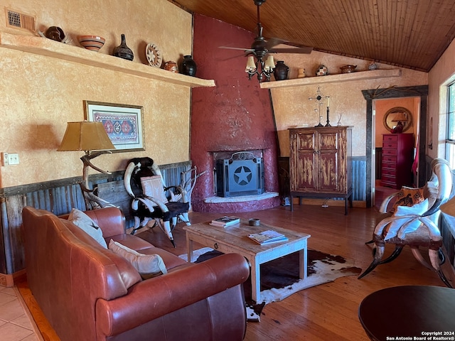 living room with lofted ceiling, light hardwood / wood-style flooring, ceiling fan, and wooden ceiling