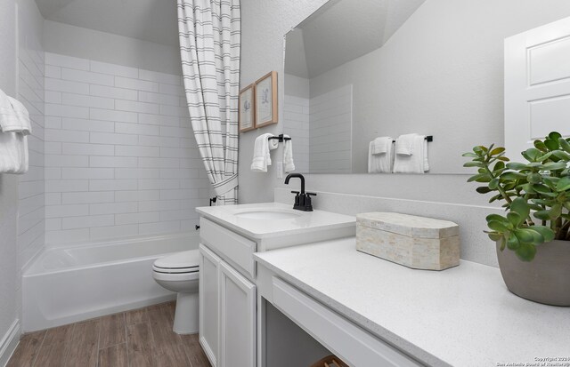 full bathroom with vanity, shower / bath combination with curtain, toilet, and wood-type flooring