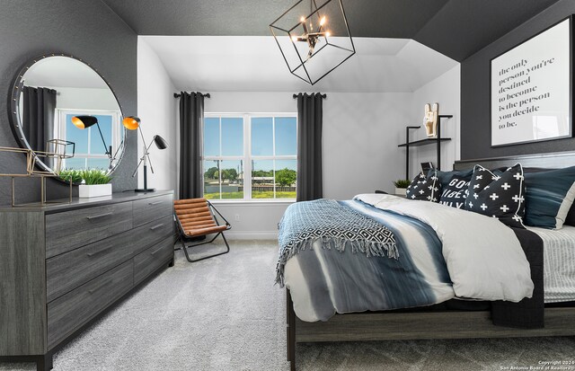 bedroom featuring multiple windows and carpet flooring