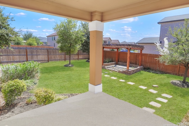 view of yard with a patio area and a pergola