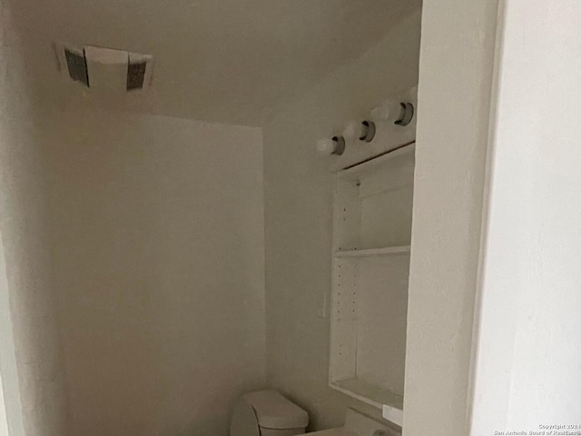 bathroom featuring toilet