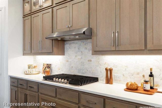 kitchen featuring tasteful backsplash and stainless steel gas cooktop