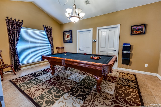 rec room featuring light tile patterned floors, a notable chandelier, lofted ceiling, and pool table