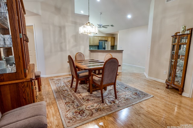 dining room with light hardwood / wood-style floors and ceiling fan