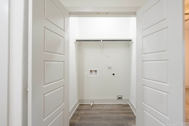 laundry area with washer hookup, dark hardwood / wood-style flooring, hookup for a gas dryer, and electric dryer hookup