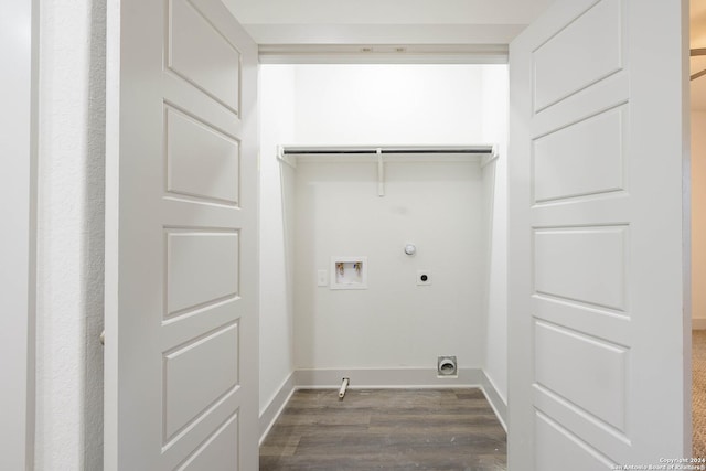 clothes washing area with hookup for an electric dryer, hookup for a gas dryer, dark wood-type flooring, and washer hookup