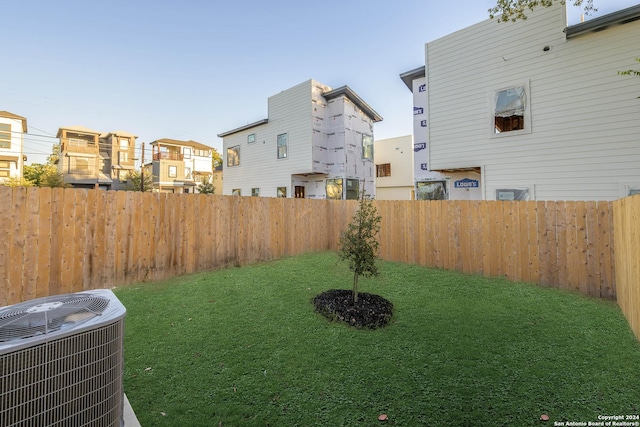 view of yard featuring central AC unit