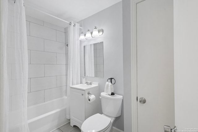 full bathroom featuring vanity, shower / tub combo, toilet, and tile patterned flooring