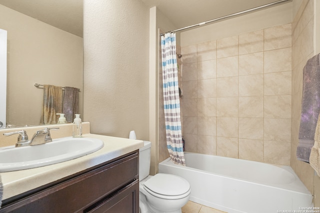 full bathroom with vanity, shower / tub combo, toilet, and tile patterned floors