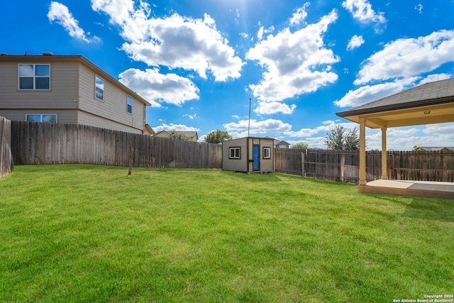 view of yard with a shed