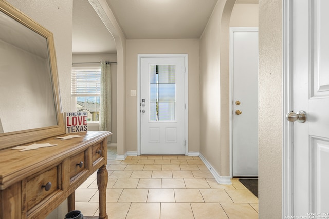 entryway featuring light tile patterned flooring