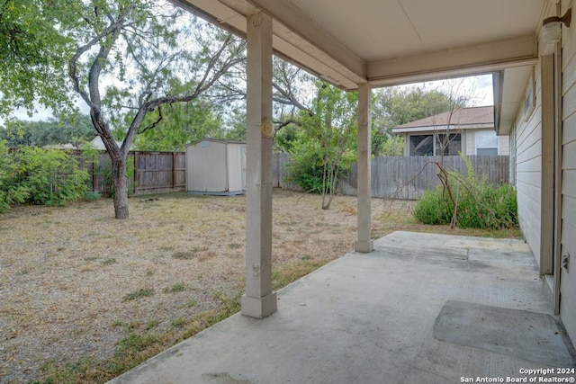 view of patio / terrace featuring a shed