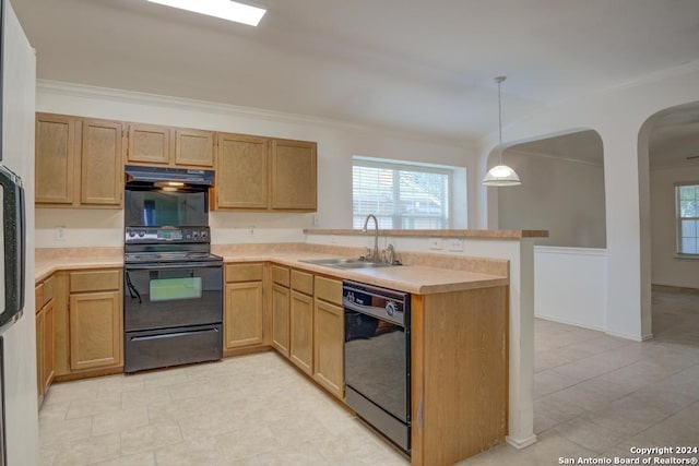 kitchen featuring hanging light fixtures, kitchen peninsula, sink, black appliances, and crown molding