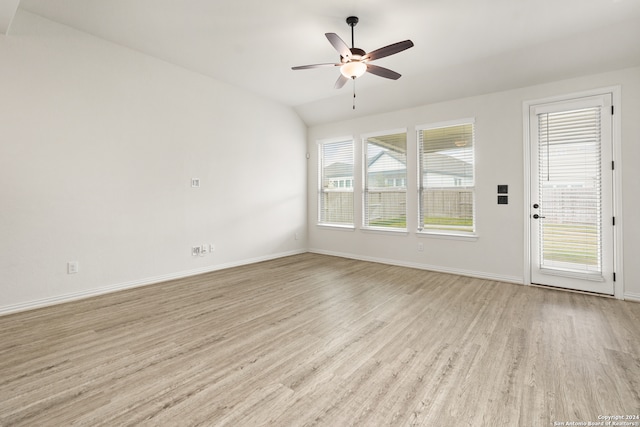 unfurnished living room with lofted ceiling, light hardwood / wood-style flooring, and ceiling fan