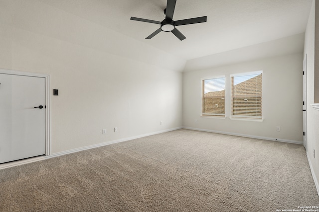 spare room with carpet floors and ceiling fan