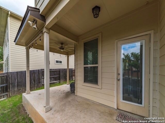 view of patio with ceiling fan