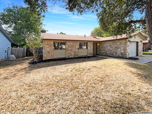 ranch-style home with a garage