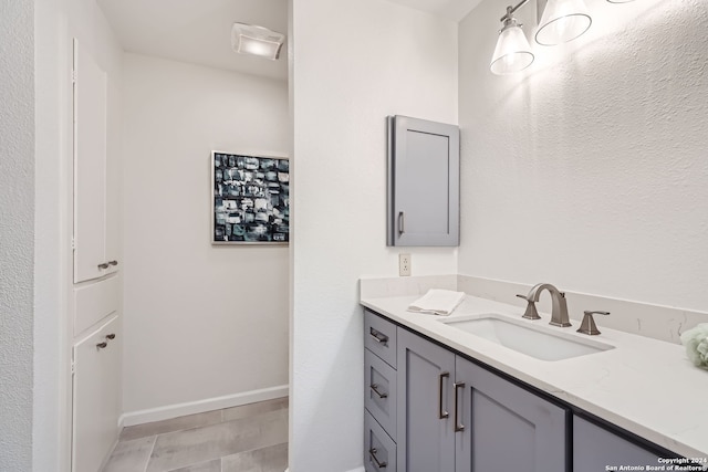 bathroom featuring vanity and tile patterned flooring