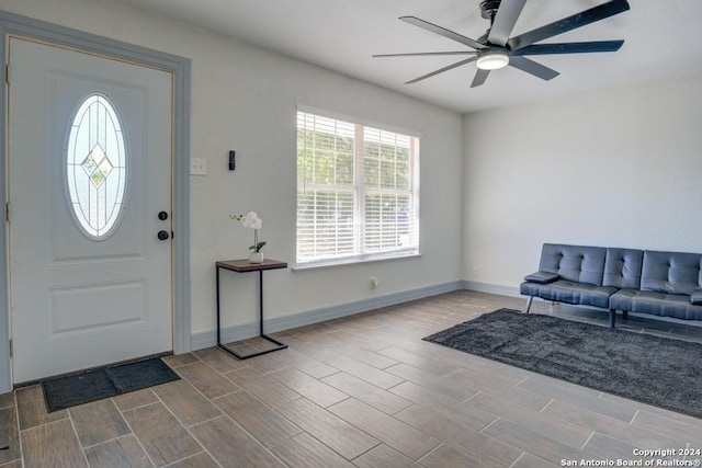 foyer featuring light hardwood / wood-style floors and ceiling fan