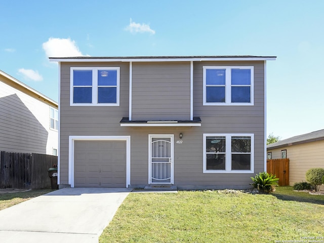 view of front of house featuring an attached garage and driveway