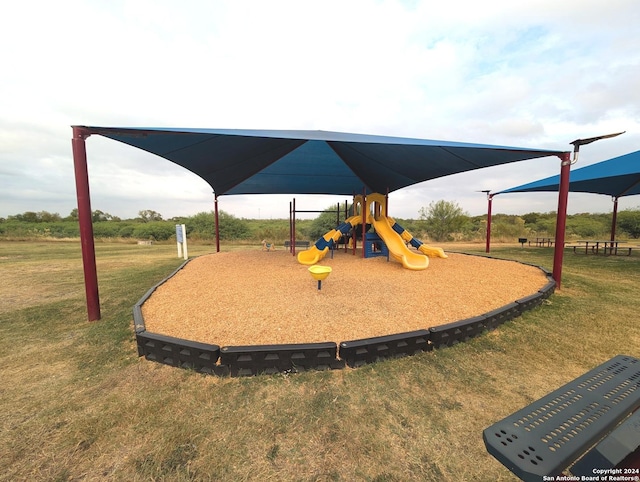 4822 Appaloosa Run, San Antonio, TX 78244 - community play area featuring a lawn