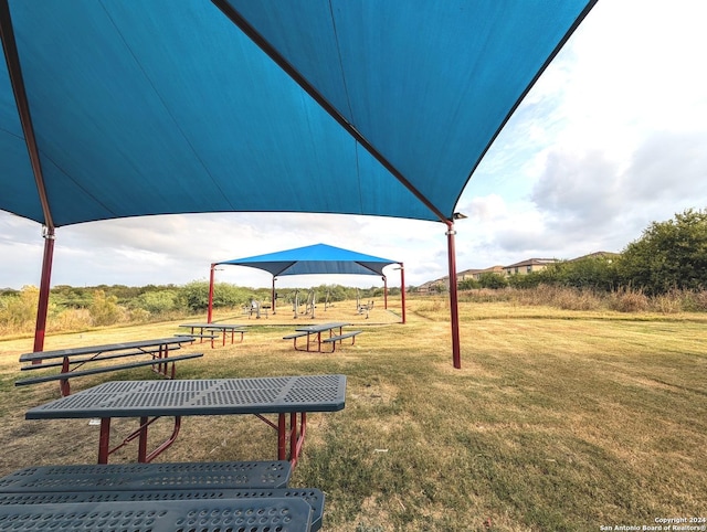 4822 Appaloosa Run, San Antonio, TX 78244 - surrounding community with a yard