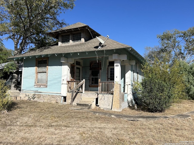 9446 Espada, San Antonio, TX 78214 - bungalow-style home with a shingled roof and covered porch