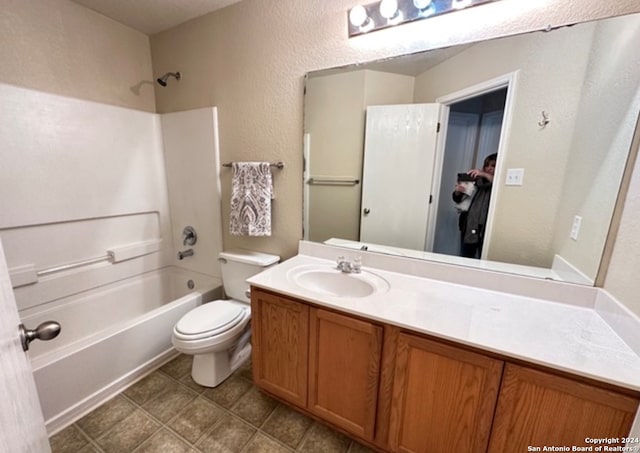 full bathroom with vanity, shower / bathing tub combination, and toilet